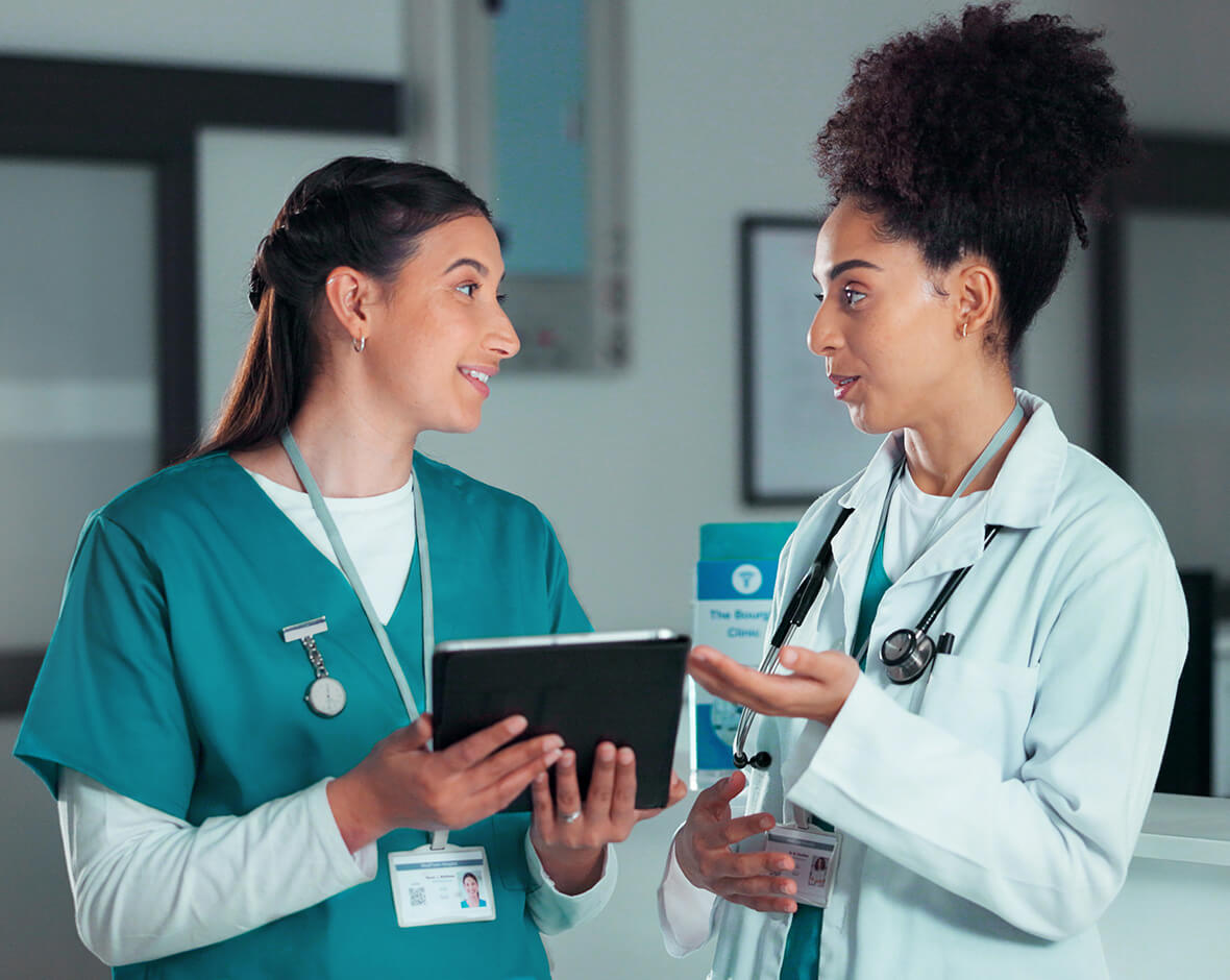 Nurse discussing test results with doctor