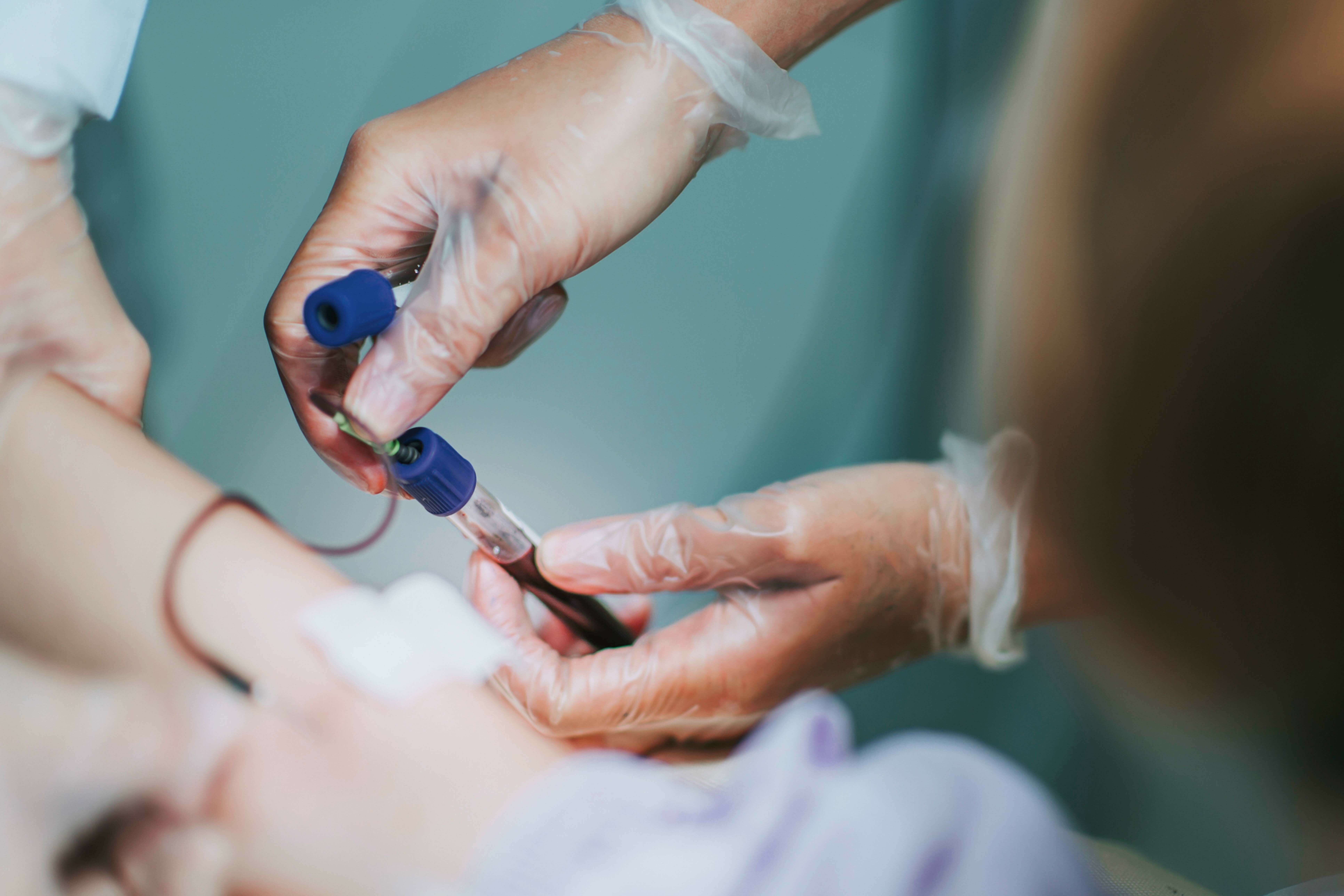 a phlebotomist drawing blood