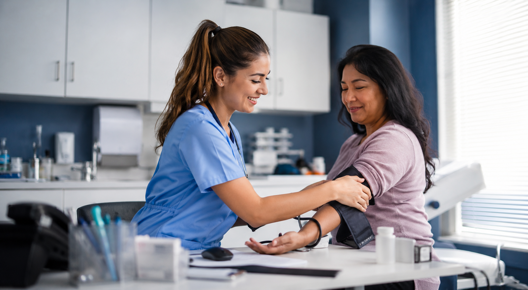 Medical assistant vs pharmacy technician career comparison showing a medical assistant checking a patient’s blood pressure in a healthcare clinic.