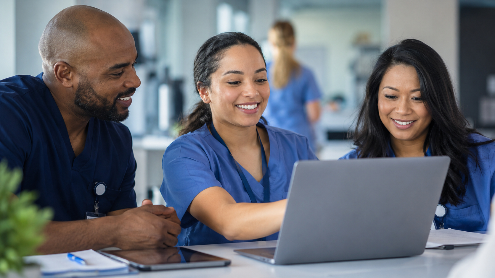 Healthcare professionals collaborating during a healthcare workforce development partnerships training session.